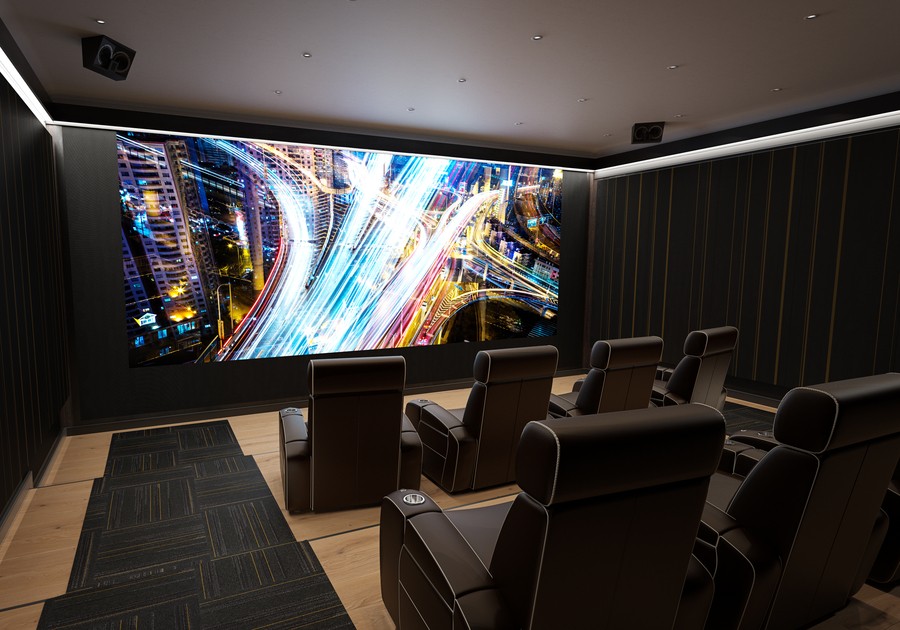 Home theater with two rows of tiered seating and a large HD display.