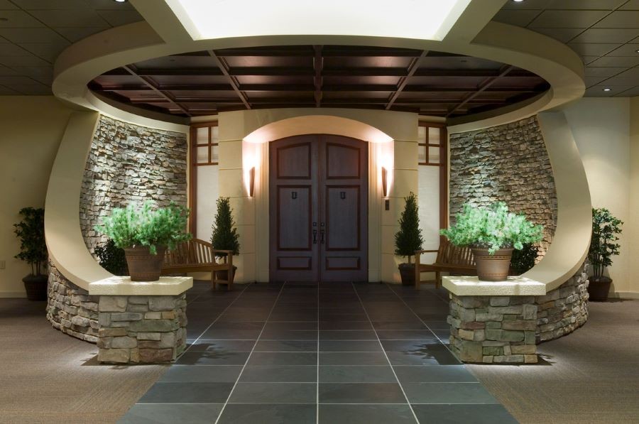 A home’s well-lit entryway and front door.