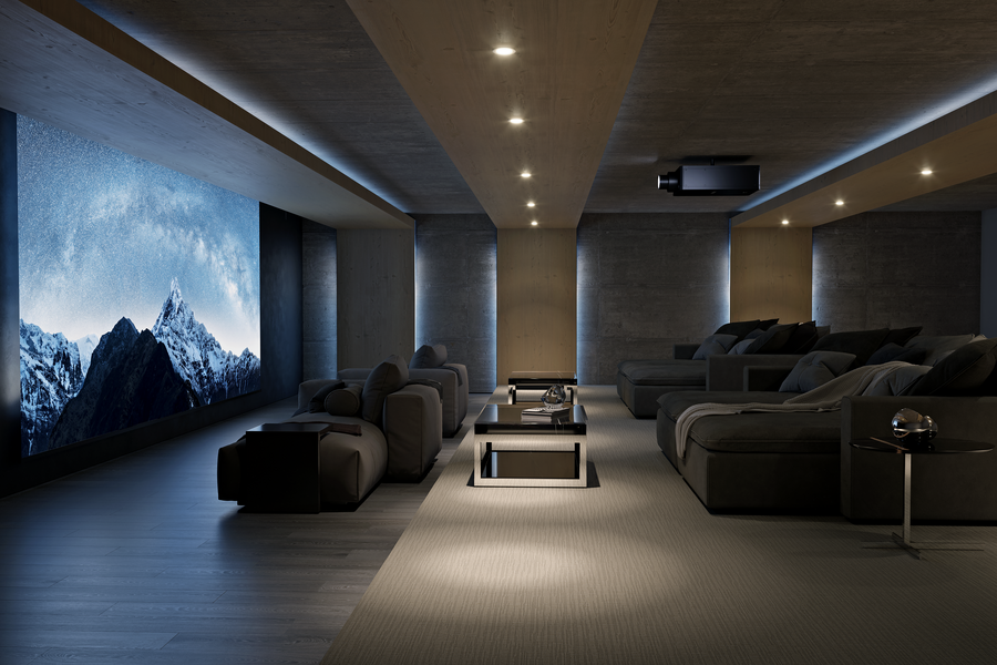 A luxury home theater with elevated home theater seating. 